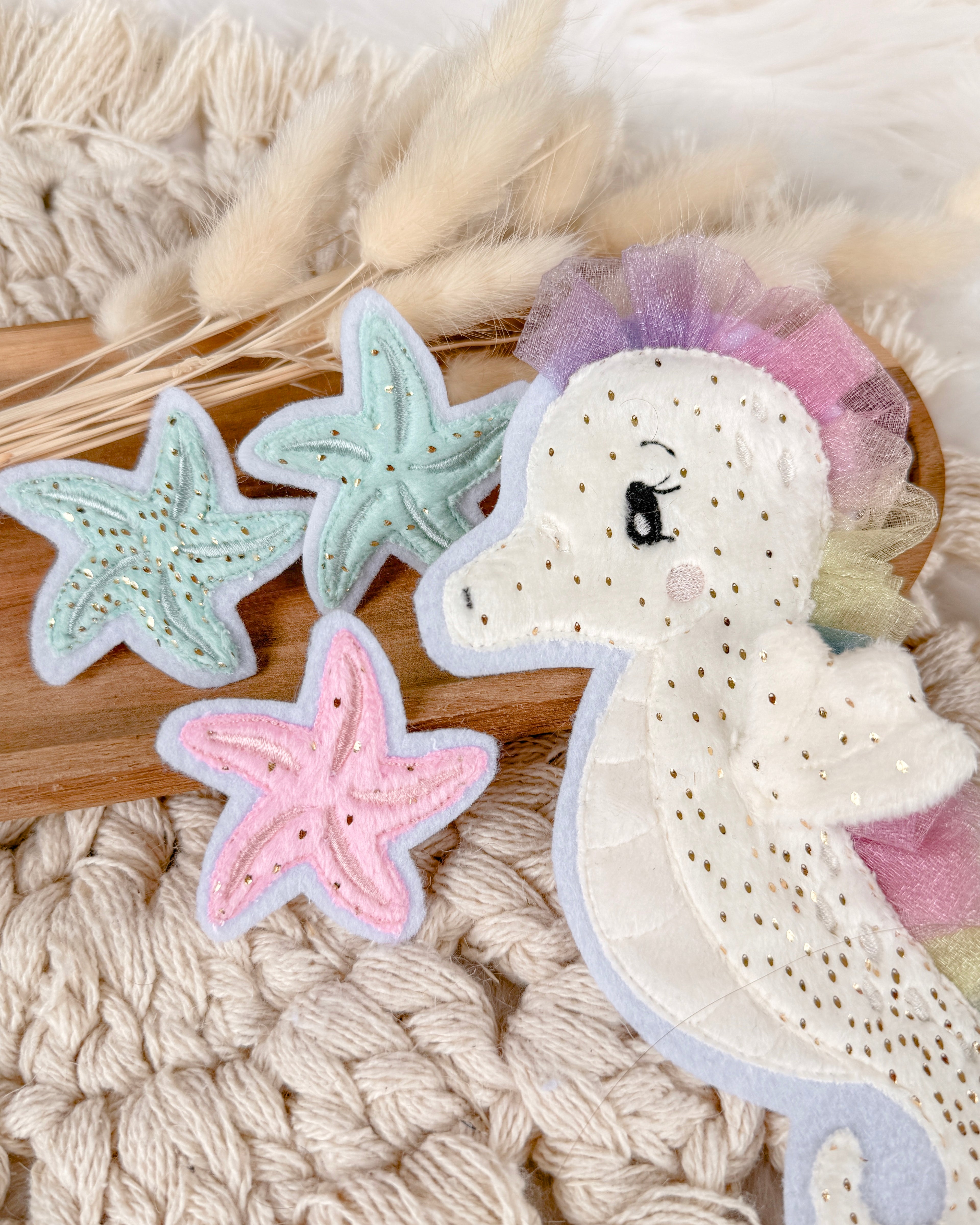 Patches Seestern un Seepferd