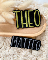 Namensapplikationen schwarz 