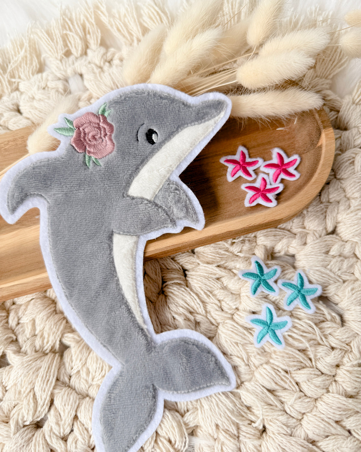 Applikation Delfin mit Seesternen