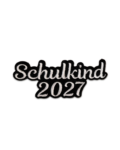 Applikation "Schulkind 2027" auf schwarzem Filz - Schrift 01