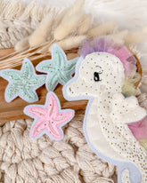 Patches Seestern un Seepferd