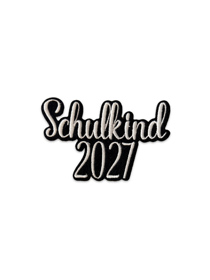 Applikation "Schulkind 2027" auf schwarzem Filz - Schrift 05